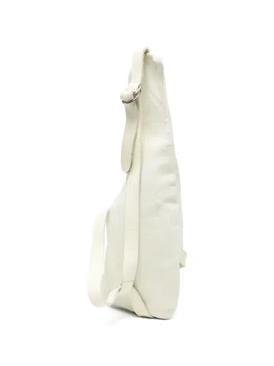 Guidi Asymmetric Leather Backpack In White