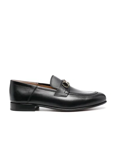 Ferragamo Gancini Ornament Mule Loafers In Black