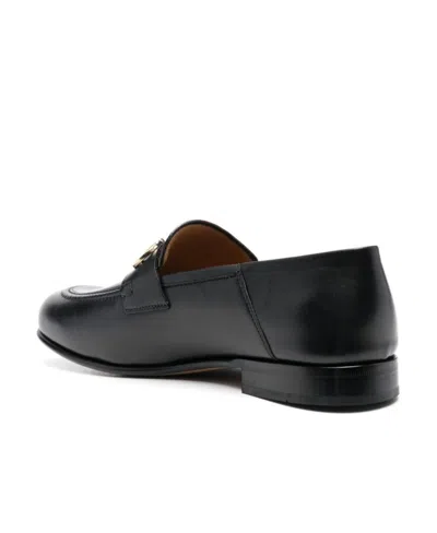 Ferragamo Gancini Ornament Mule Loafers In Black