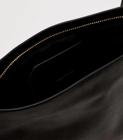 Allsaints Leather Bettina Large Leather Clutch Bag In Black