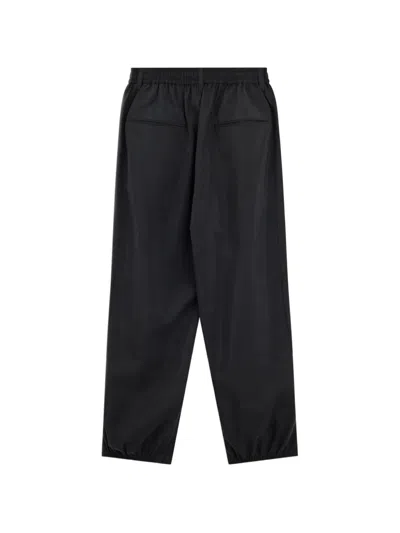 Ssstein Elasticated Zip-cuff Trousers In Black