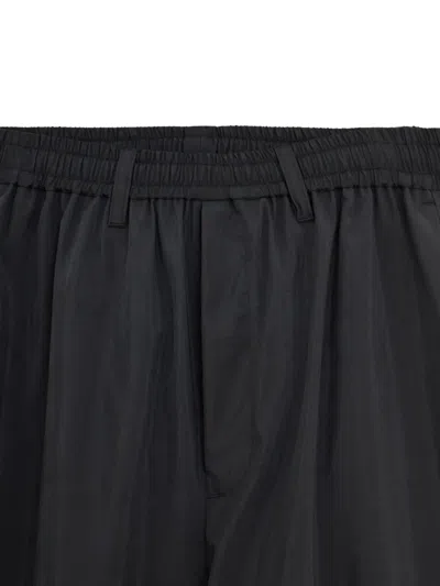 Ssstein Elasticated Zip-cuff Trousers In Black
