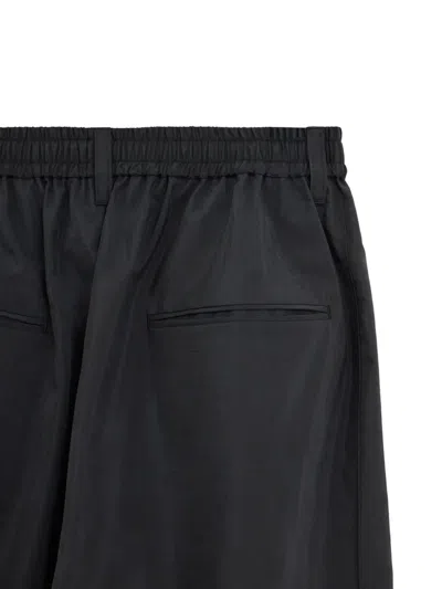 Ssstein Elasticated Zip-cuff Trousers In Black
