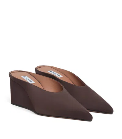 Alaïa Suede Cube Wedge Mules In Brown