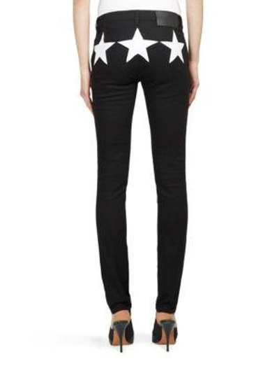 Shop Givenchy Star Print Detail Jeans In Black
