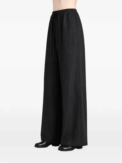 Amomento Drawstring Palazzo Pants In Black