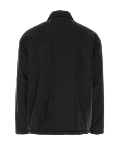 Prada Logo-print Padded Jacket In Blue