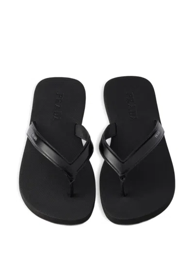 Prada Logo Embossed Leather Flip Flop Sandals In Black