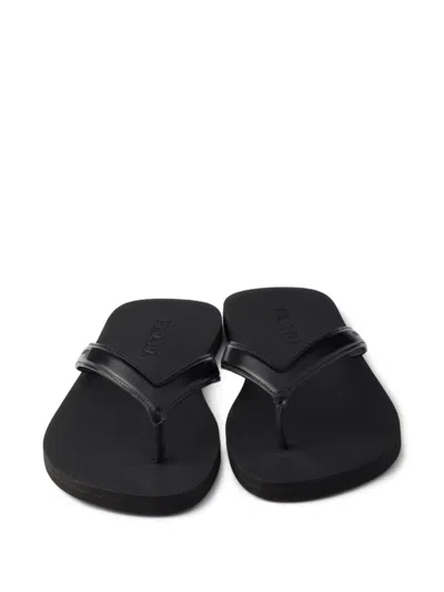 Prada Logo Embossed Leather Flip Flop Sandals In Black