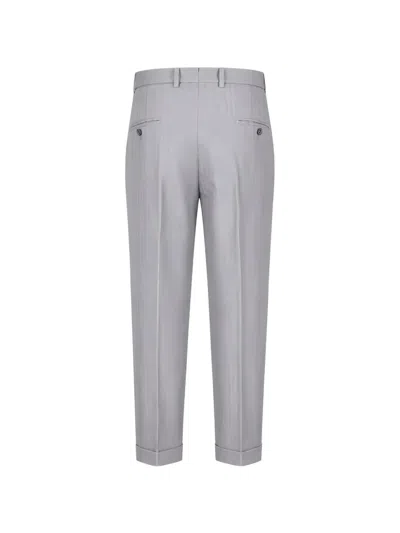 Gta Pleated Herringbone-pattern Trousers In Gray