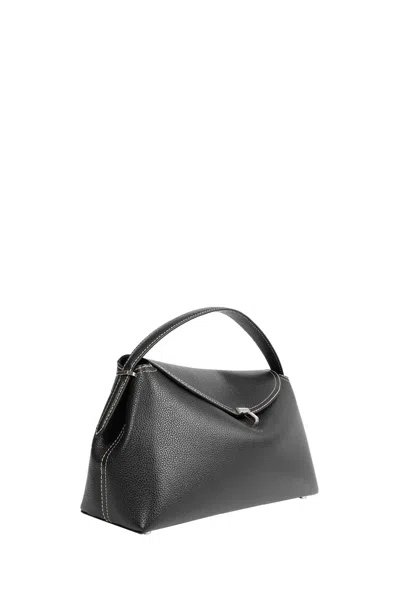 Totême Structured Black Leather Shoulder Bag With Flap Closure