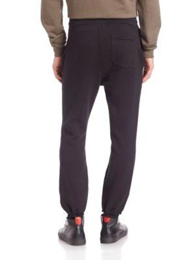 Shop John Elliott Raw Edge French Terry Slim-fit Sweatpants In Black