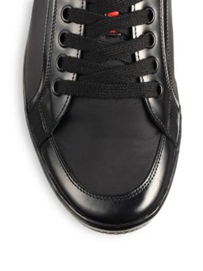 Shop Prada Nylon Laced Sneakers In Black