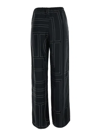 Totême Toteme Women Silk Trousers With Monogram Logo Embroidery In Animal Print