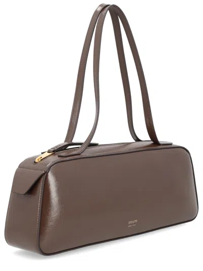 Khaite Simona Crackle Patent Elongated Tote Bag In Brown