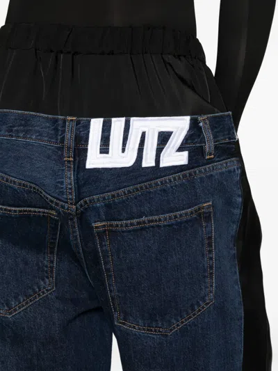 Lutz Huelle Layered-panel Jeans In Multi