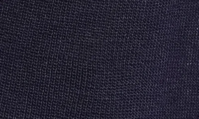 Cyrus Button Front Sleeveless Sweater In Black