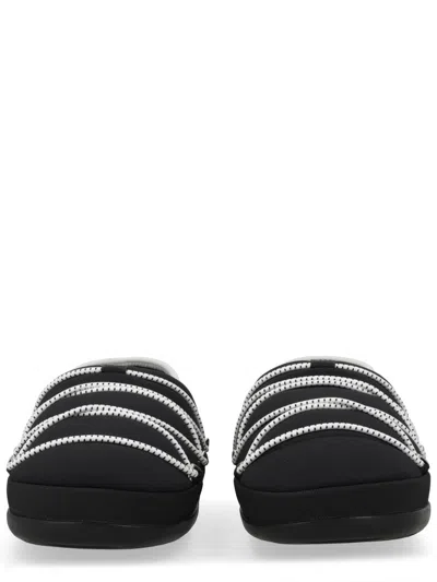 Moon Boot Slipper Icon In Black