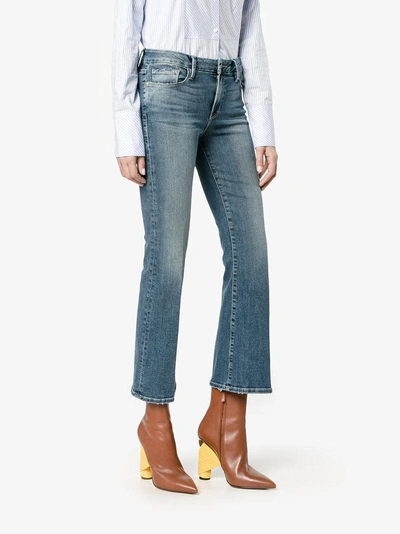 Shop Frame Flared Cropped Jeans In Blue