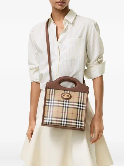 Burberry Coated Canvas Mini Pocket Handbag 24cm X 29cm In Brown