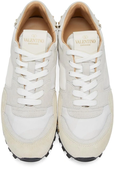 Shop Valentino White  Garavani Camo Rockstud Sneakers