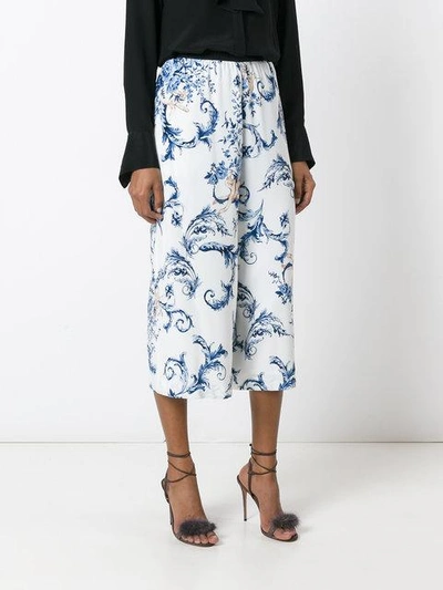 Shop Antonio Marras Floral Print Cropped Trousers In Blue