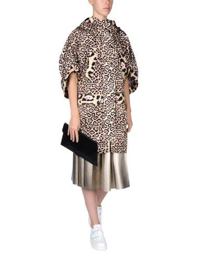 Shop Givenchy Overcoats In Sand