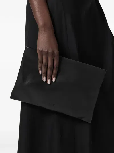Allsaints Leather Bettina Large Leather Clutch Bag In Black