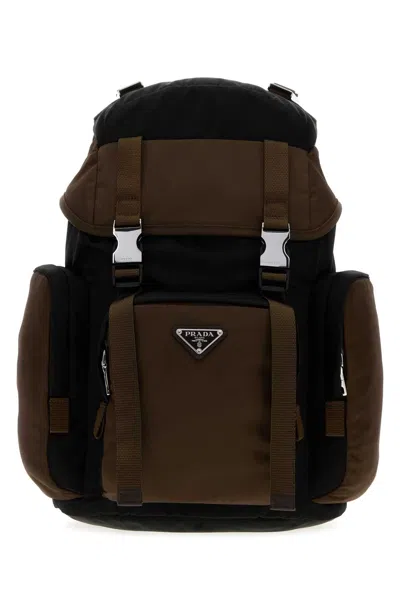 Prada Renylon Backpack Featuring Practical Side Pockets In Brown