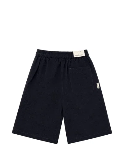 Michael Coal Seersucker Drawstring Shorts In Blue