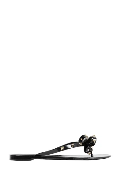 Valentino Garavani Mini Bow Sandals With Platinum-finish Studs In Black