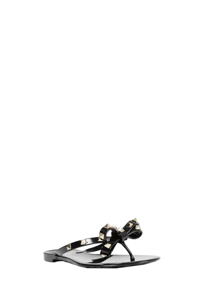 Valentino Garavani Mini Bow Sandals With Platinum-finish Studs In Black