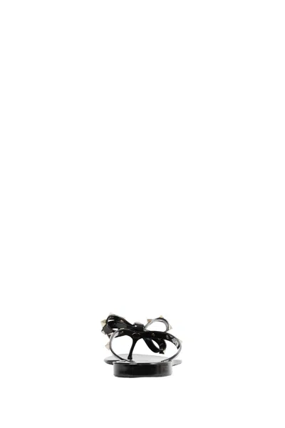 Valentino Garavani Mini Bow Sandals With Platinum-finish Studs In Black