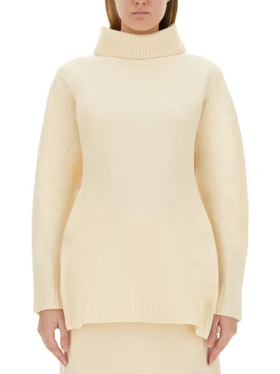 Jil Sander Ivory Solid Turtle Neck Sweater In White