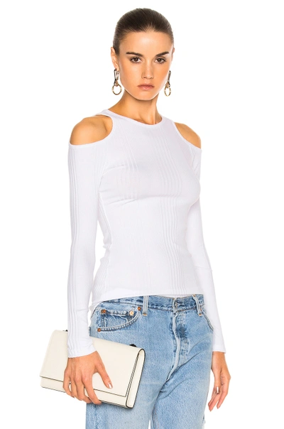 Shop Frame Denim Variegated Cut Out Long Sleeve In White. In Blanc