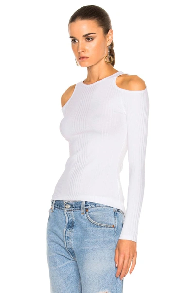 Shop Frame Denim Variegated Cut Out Long Sleeve In White. In Blanc