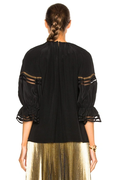 Shop Fendi Blouse With Cut Out Sleeve Detail In Black.