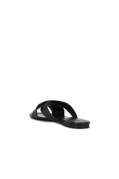 Khaite Liria Glossed-leather Sandals In Black