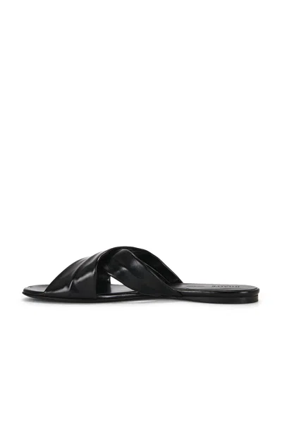 Khaite Liria Glossed-leather Sandals In Black