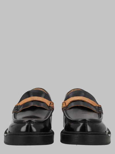 Maison Margiela Sophisticated Loafers For Men In Black