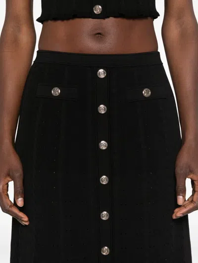 Sandro Button-embellished Flared Skirt In Black