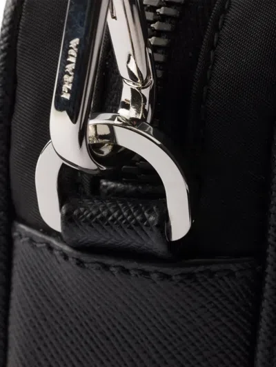 Prada Small Shoulder Bag With Adjustable Strap And Front Zip Pocket In Black