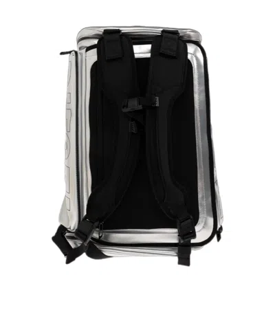 Diesel Logo-print Metallic-effect Backpack In Silver