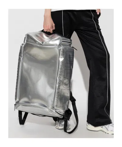 Diesel Logo-print Metallic-effect Backpack In Silver