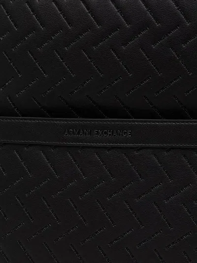 Armani Exchange Embossed-logo Grained-effect Backpack In Black