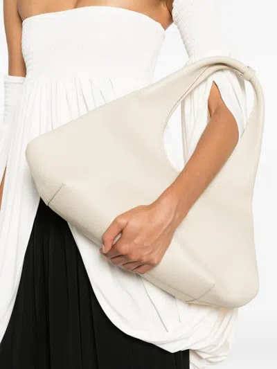 Coperni Folded Zip Shoulder Bag In Neutral