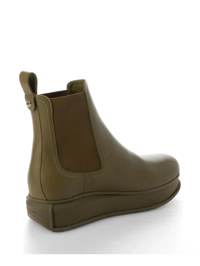 Ferragamo Elasticated-panel Pull-tab Boots In Brown