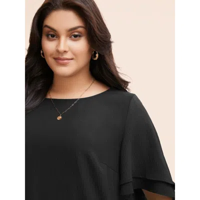 Bloomchic Women's Plus Size Solid Tiered Ruffles Split Hem Blouse Black Solid Elegant Half Sleeve Round Neck 1 In Black