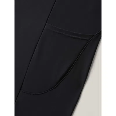 Bloomchic Women's Plus Size Sculpting Pockets Solid Swim Shorts Black Solid Short Patchwork Elastic Waist 28/5 In Black