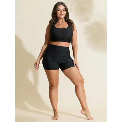 Bloomchic Women's Plus Size Sculpting Pockets Solid Swim Shorts Black Solid Short Patchwork Elastic Waist 28/5 In Black